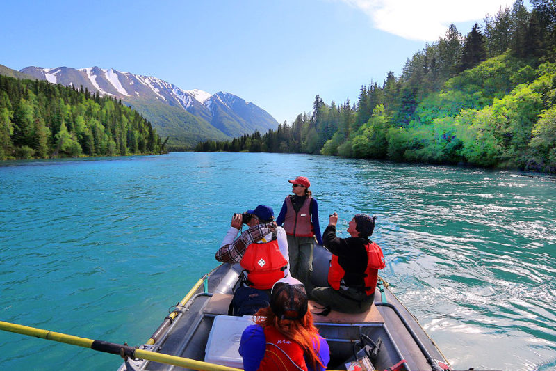group of people floating down the Kenai taking pictures