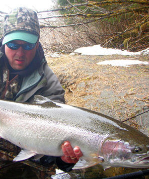 man holding nice steelhead trout